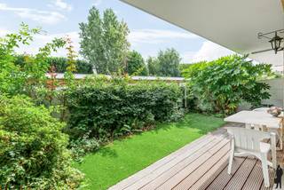 Gelijkvloers appartement met 2 slaapkamers, tuin/terras en garagebox in rustige buurt te EdegemAlgemeen:- Bewoonbare oppervlakte: ca. 90m²- 2...