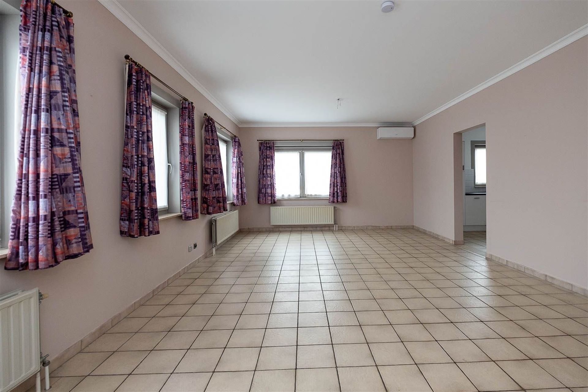 Appartement met 2 slaapkamers, inpandige garage met oprit en privé tuin 95m² - foto 2