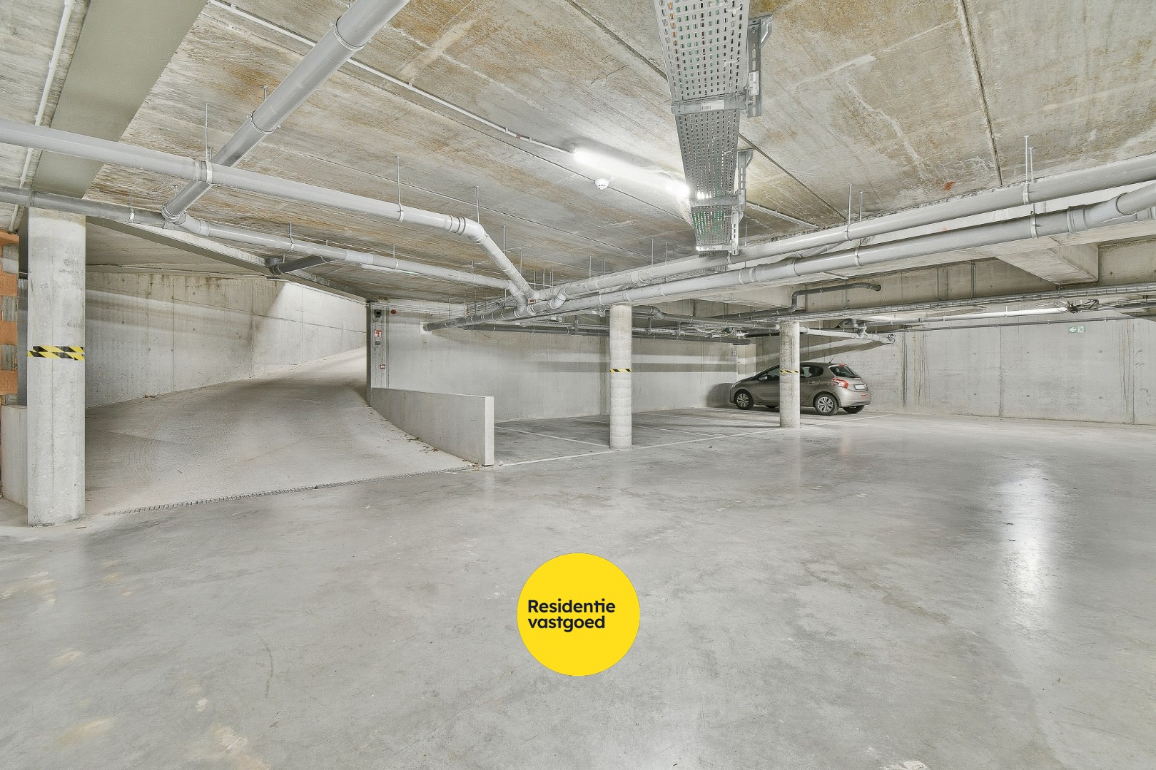 Ondergrondse parkeerplaatsen te koop in het centrum van Gistel - foto 1