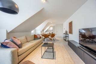 Right in the center of Nieuwpoort-Stad, with shops, restaurants, and the market within walking distance, we find this move-in ready duplex apartment in the recent residence Maiden Lane. The living space is stylishly finished and fully painted, so you can move in right away without any additional work.<br /><br />The duplex apartment is located on the 3rd and 4th floor and is laid out as follows:<br />Entrance hall with separate toilet and storage room, open fitted kitchen, bright living room, and the first bedroom. On the upper floor, we find the very spacious second bedroom, storage room, and a fitted bathroom connected by a staircase.<br /><br />Advantages:<br />- Recent residence (2021)<br />- Favorable EPC A<br />- Central location in the center of Nieuwpoort<br />- Two cellar storage rooms included in the price<br />- Possibility to purchase a parking space<br /><br />Want to see more and know more about this property? Be sure to watch the video on our website or contact us for a visit.