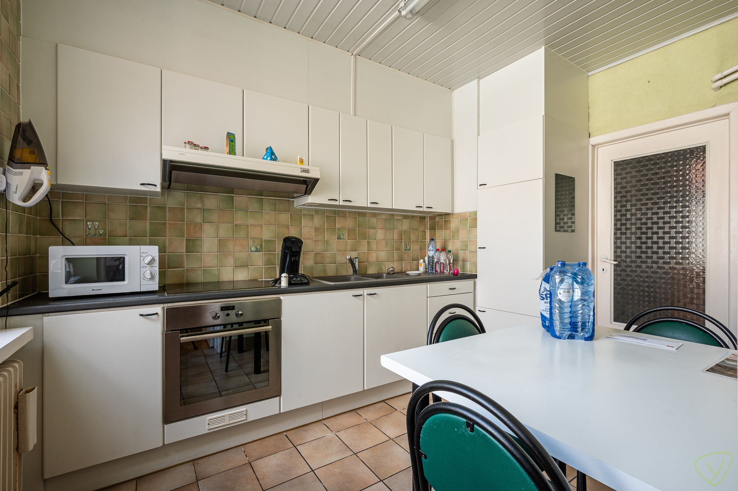 Woning met winkelruimte te koop in het centrum van Ursel - foto 4