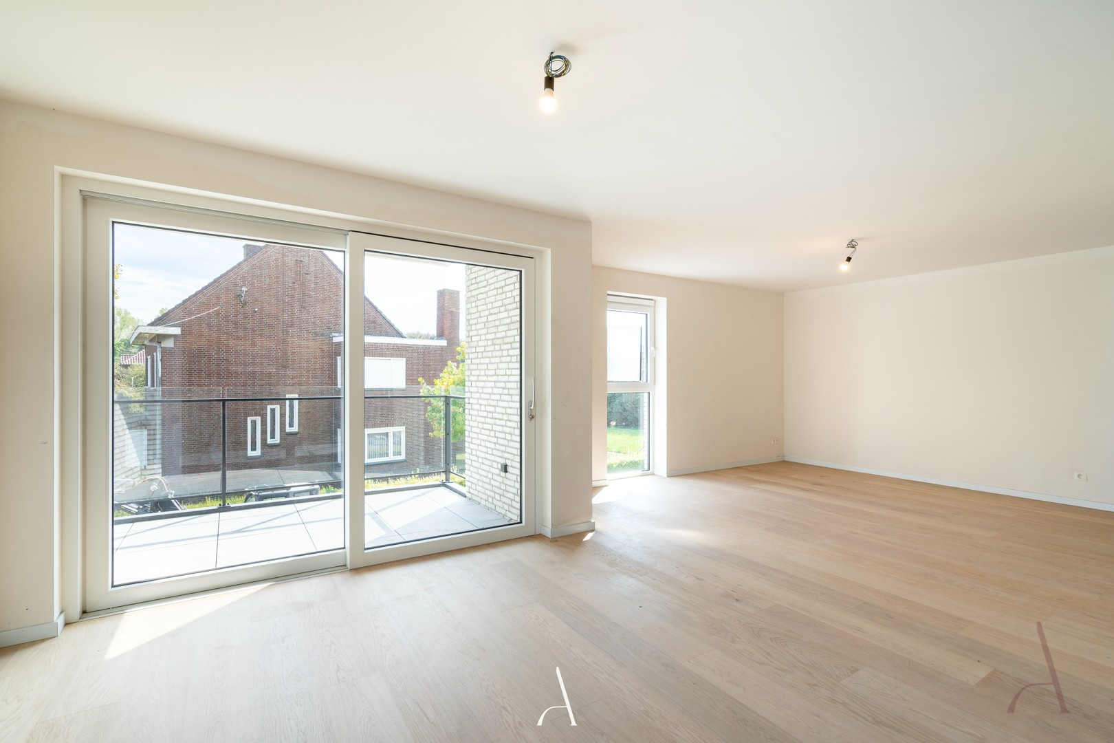 Te huur - Recent en energiezuinig 2-slaapkamerappartement met ondergrondse autostandplaats - foto 4