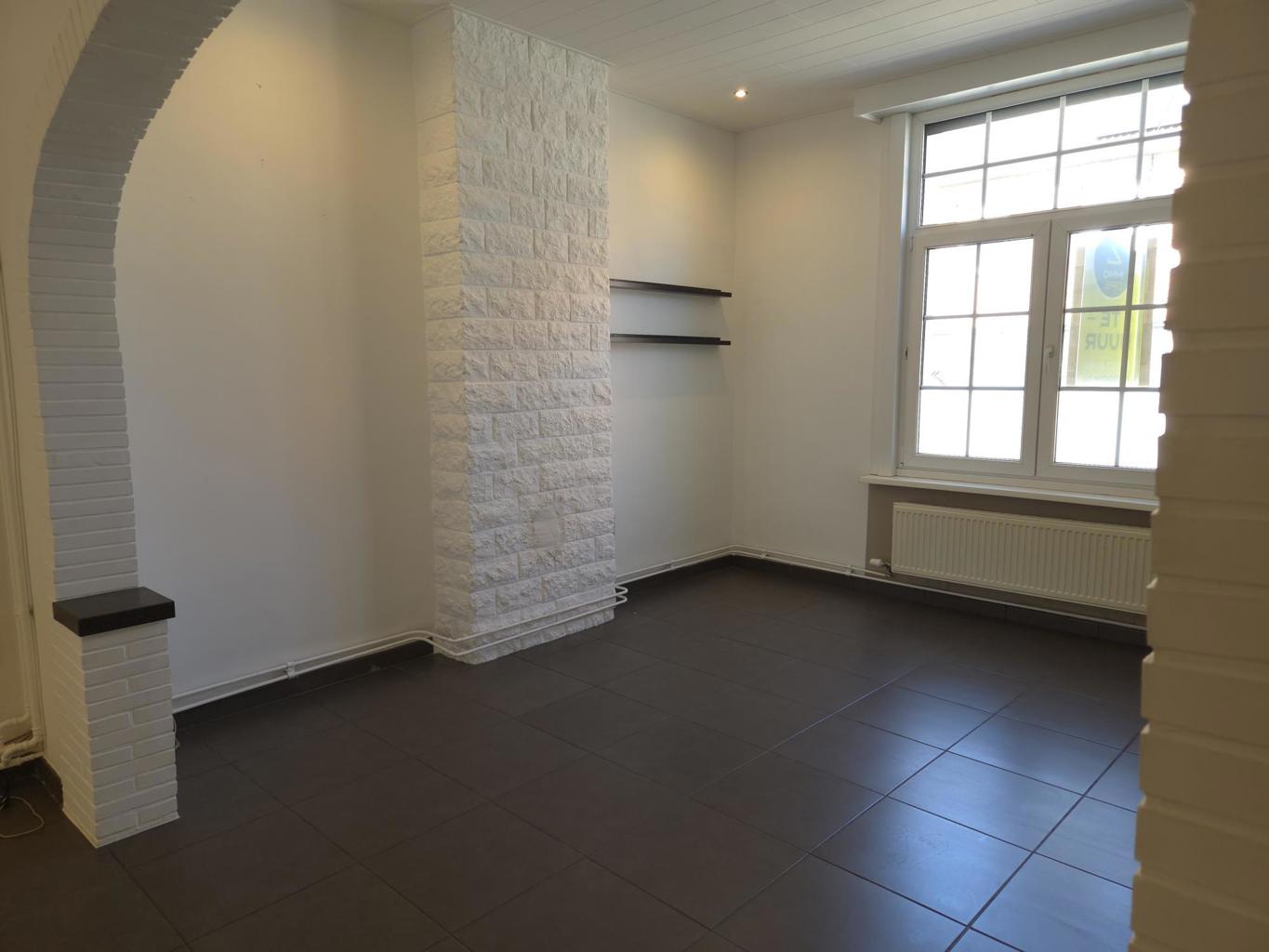 Halfopen bebouwing nabij centrum Arendonk met ruime tuin. - foto 5