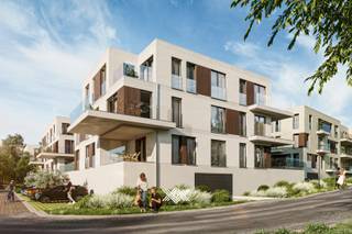 Dit tweeslaapkamer appartement van 86,9 m² op het tweede verdiep beschikt over een inkomhal, een lichtrijke leef- en eetruimte met open keuken...