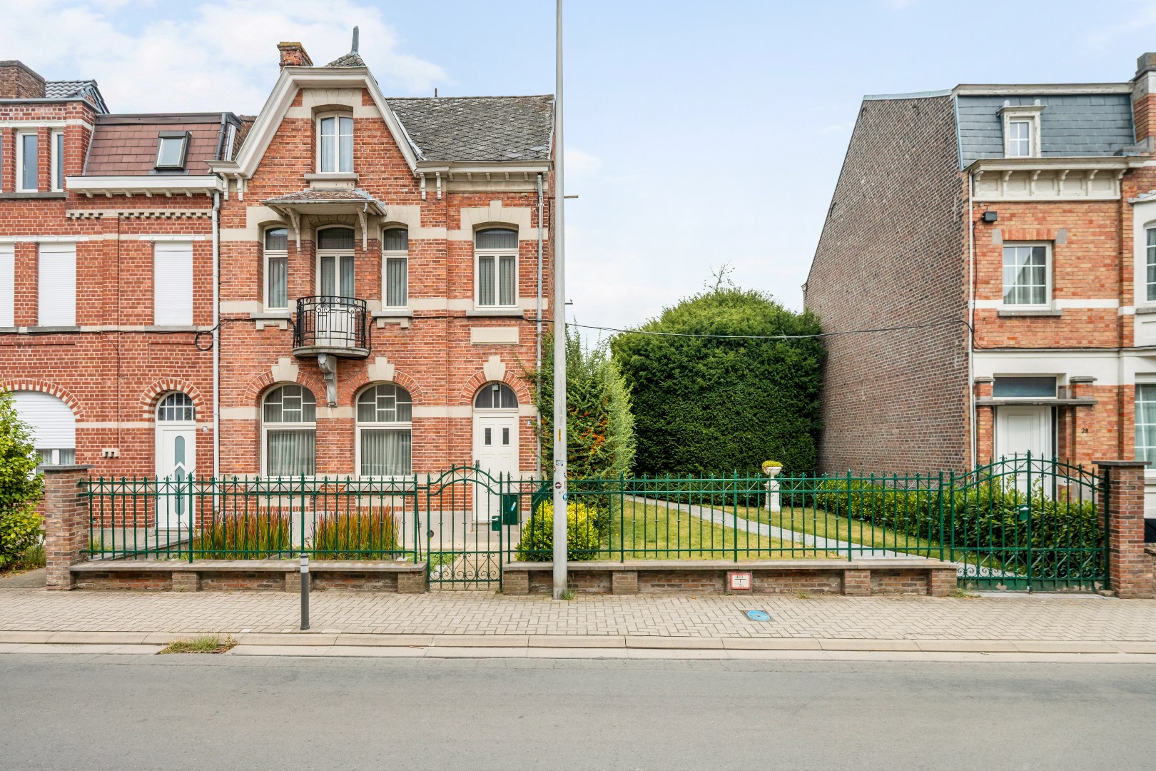 Authentieke woning met potentiële bouwgrond in centrum Opwijk - foto 1