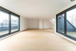 Penthouse luxueux avec vue panoramique sur le parc au cœur de WaregemCe penthouse exclusif de 167 m² avec deux terrasses spacieuses (17,44 m²...