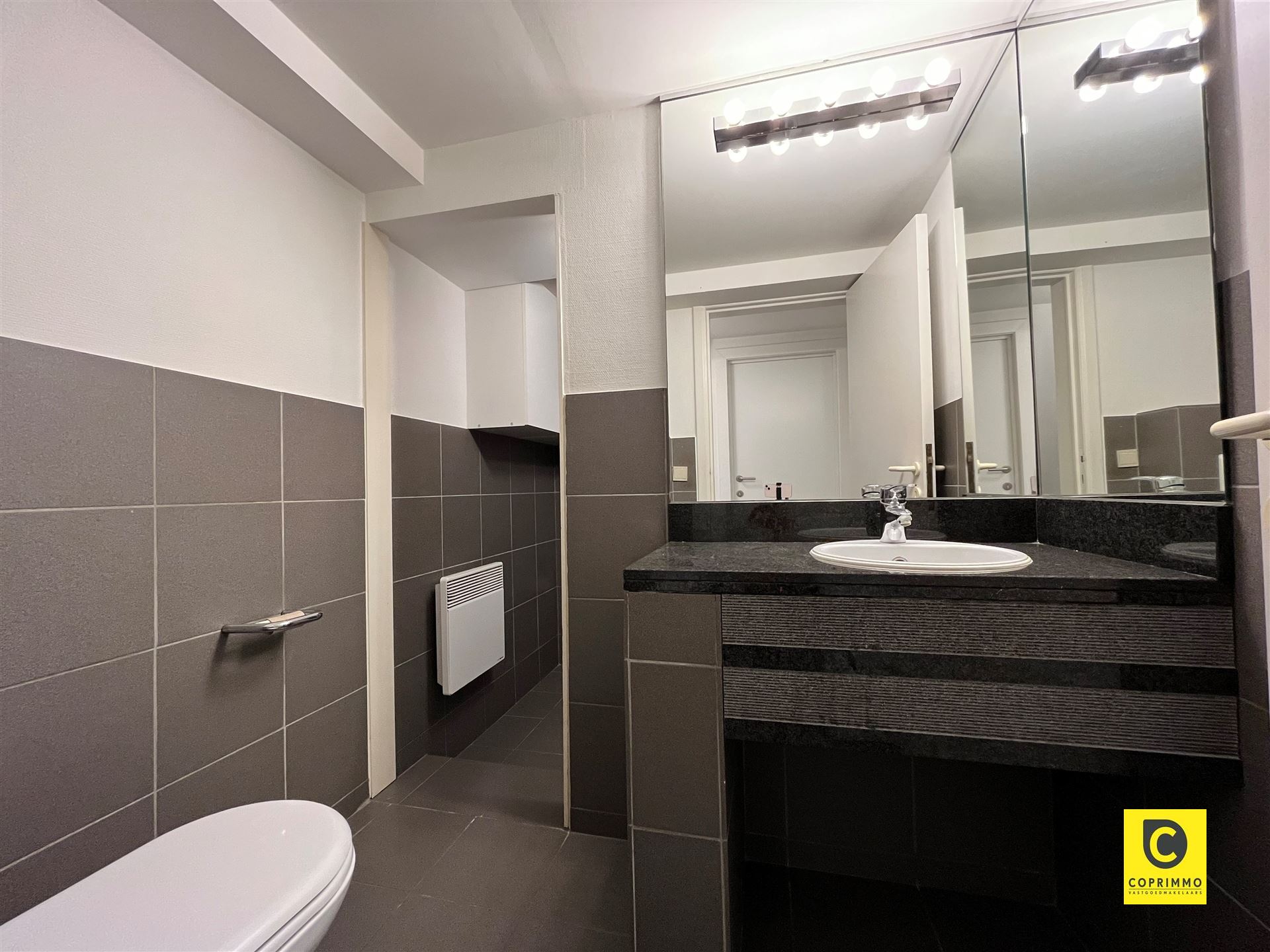 Gelijkvloerse studio op rustige ligging met terras - foto 4