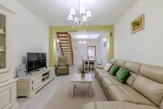 Instapklare gezinswoning met 2 slaapkamers en tuin - toplocatie.Instapklare en moderne gezinswoning in het stadscentrum. Deze uitstekend onderhouden...