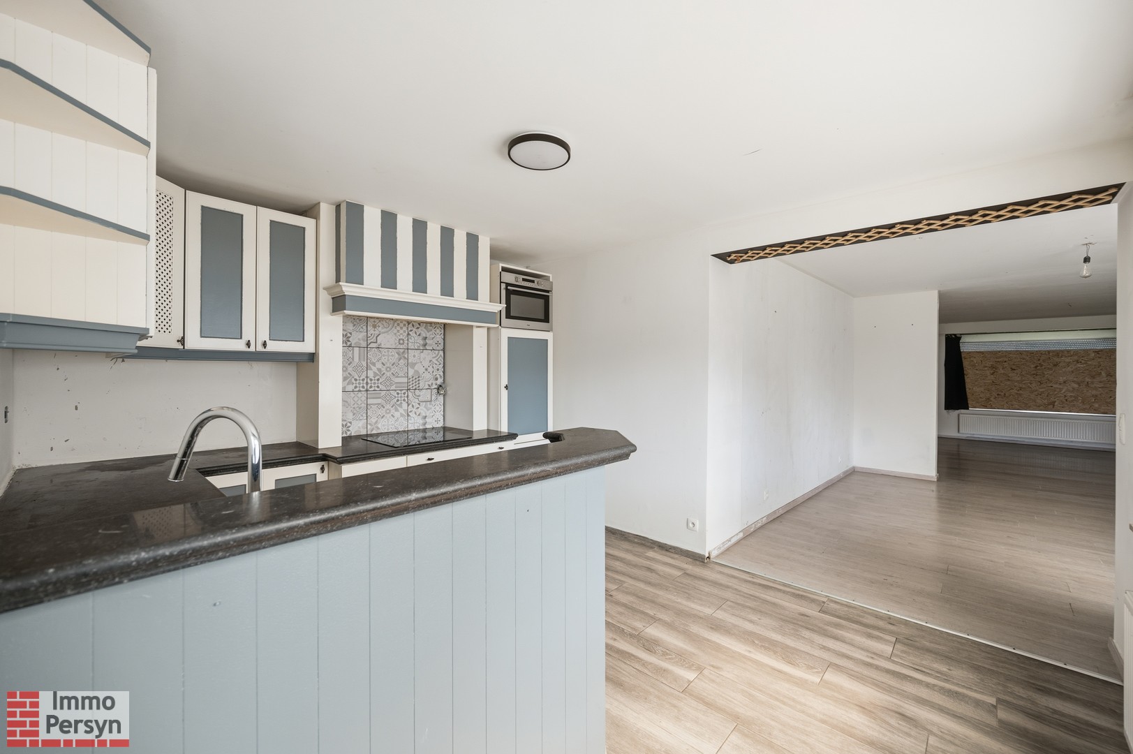 Ruime af te werken woning met nieuw dak, vernieuwde elektriciteit en diepe tuin (EPC D) - foto 5