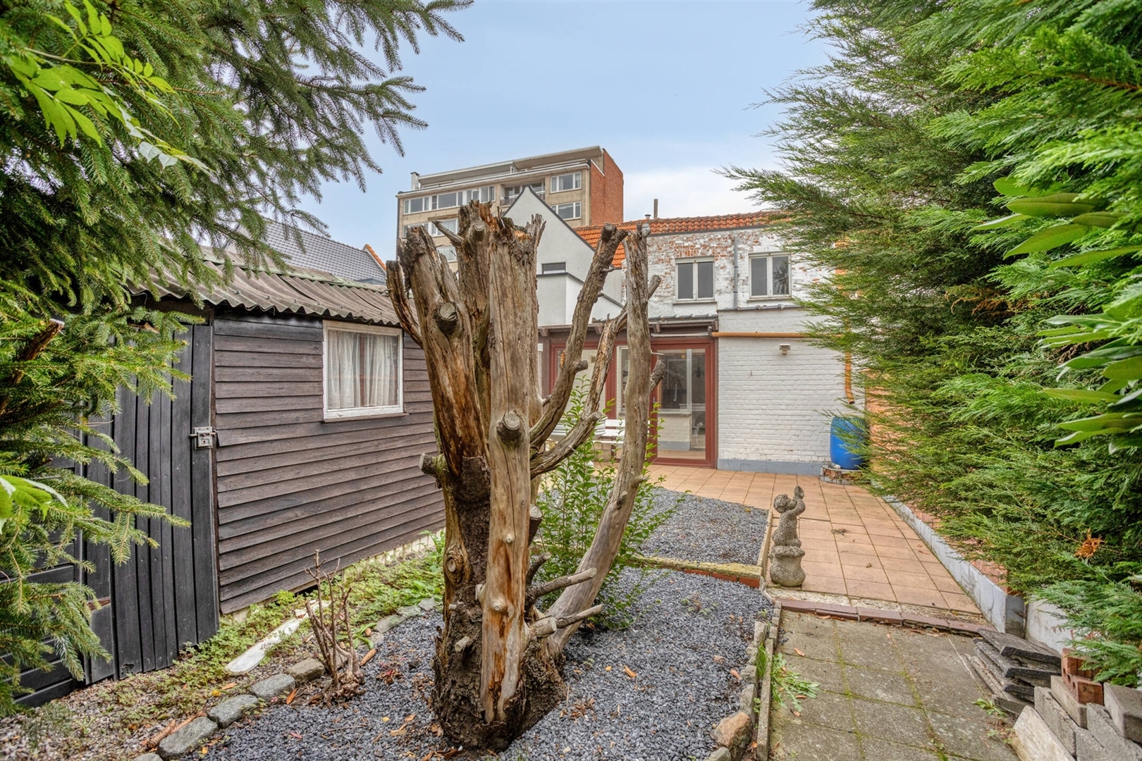 Gezellige woning met leuke stadstuin en garagebox. - foto 3