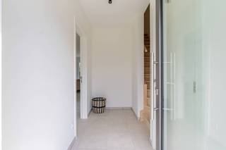 On Sint-Truidersteenweg 419A in Sint-Lambrechts-Herk, we find this energy-efficient new-build home with a habitable surface of 169 m². On the ground floor, we enter through the entrance hall, which provides access to the separate toilet and kitchen. The kitchen is adjacent to the living room where the large windows provide a lot of light. The sliding windows give access to the terrace and garden where you can relax in the sun. There is also a storage room on the ground floor.<br />On the first floor, there are three spacious bedrooms, storage room and bathroom (double sink, bath and shower).<br /><br />The underground car park has a parking space (mandatory to purchase) and private basement storage (optional). There is also a communal bicycle shed.<br /><br />Advantages:<br />- BEN home<br />- Latest techniques<br />- Spacious and bright home<br />- Practical layout<br />- Car-free zone<br /><br />Relevant documents are also available on our website www.dewaele.com
