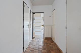 Indeling:Gelijkvloerse verdieping:- inkomhal- apart toilet met handenwasser- woon- eetkamer voorzien van een pelletkachel (32m²)- uitgeruste...