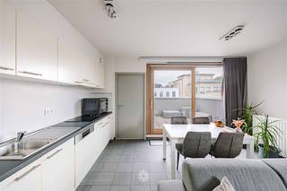 <p><span>GHENT - Looking for an</span><span> Instap-ready rooftop apartment with spacious, sunny terrace at Ghent's Sint-Pieters station for sale? </span></p><p><span>Then this property is for you.</span></p><p><span> </span></p><p><span>The most important assets in a nutshell: <br /><br /></span></p><ul><li><span>Located at a top location </span><span>near Ghent-Sint-Pieters Station</span></li><li><span>Easily accessible, yet in a green inner area</span></li><li><span>Penthouse apartment </span></li><li><span>Ideal for own occupation as well as investment or for studying children</span></li><li><span>Energy efficient</span><span> </span></li><li><span>Close to stores, schools and public transport</span></li><li><span>Spacious terrace with good orientation (South-East)</span></li><li><span>Ready to move in and well maintained</span></li><li><span>Low common costs</span></li><li><span>Abundance of natural light</span></li></ul><p><span> </span></p><p><span>This is what the layout looks like:</span></p><p><span>Entrance hall, separate toilet, storage room,</span><span> living area, dining area, open kitchen with large sliding window, terrace, bedroom and bathroom with bathtub.</span></p><p><span> </span></p><p><span>Important:</span></p><p><span>Guide price apartment: 325,000 EUR</span></p><p><span>EPC: 169 kWh/(m² year)</span></p><p><span> </span></p><p><span>Contact Axel Lenaerts estate agents for further info or a site visit: 09 245 24 24 or <span>hannelore@axellenaerts.be</span></span></p><p><span> </span></p><p><span> </span></p>