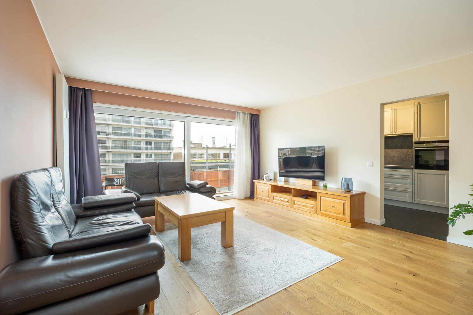 Modern appartement met twee slaapkamers en terras te Deurne! - foto 4