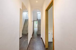 Te koop in Aalst, Nestor De Tièrestraat 6: een woning van 127 m² met twee slaapkamers en twee badkamers, ideaal voor wie op zoek is naar...