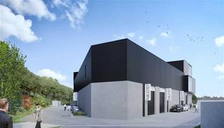 Nieuwbouw KMO-unit te koop met een oppervlakte van 216 m² en 7 privatieve parkeerplaatsen.<br />De loods maakt deel uit van het bedrijvenpark Buda, een modern KMO-park gelegen langs de Budasteenweg 26 in Machelen, op een strategische locatie vlakbij de Ring van Brussel (R0). Dit biedt uitstekende verbindingen naar zowel het centrum van Brussel als belangrijke autosnelwegen, ideaal voor bedrijven die mobiliteit en logistieke efficiëntie centraal stellen.<br /><br />Binnen het park kan een nieuwbouwproject van +/- 1.480 m² gerealiseerd worden, volledig op maat van de koper. Het gebouw biedt tal van mogelijkheden: het kan als één geheel worden ontwikkeld of opgesplitst worden in meerdere units, afhankelijk van de specifieke noden van de eindgebruiker. Hierdoor is het project geschikt voor zowel kleine als middelgrote bedrijven, actief in uiteenlopende sectoren. Daarnaast bestaat de mogelijkheid om een mezzanine toe te voegen, wat extra flexibiliteit biedt in het gebruik van de ruimte.<br /><br />De combinatie van flexibiliteit in bouwopties, een toplocatie vlakbij logistieke en economische hubs, en een aantrekkelijke, professionele omgeving maakt Bedrijvenpark Buda een uitstekende keuze voor groeiende ondernemingen.<br />Mogelijkheid tot aankopen van privatieve parkeerplaatsen. Ruime parkeermogelijkheid op het verharde terrein.<br /><br />Voor meer informatie, plannen of een vrijblijvend plaatsbezoek kan u terecht bij PANORAMA B2B op 02 540 20 20.