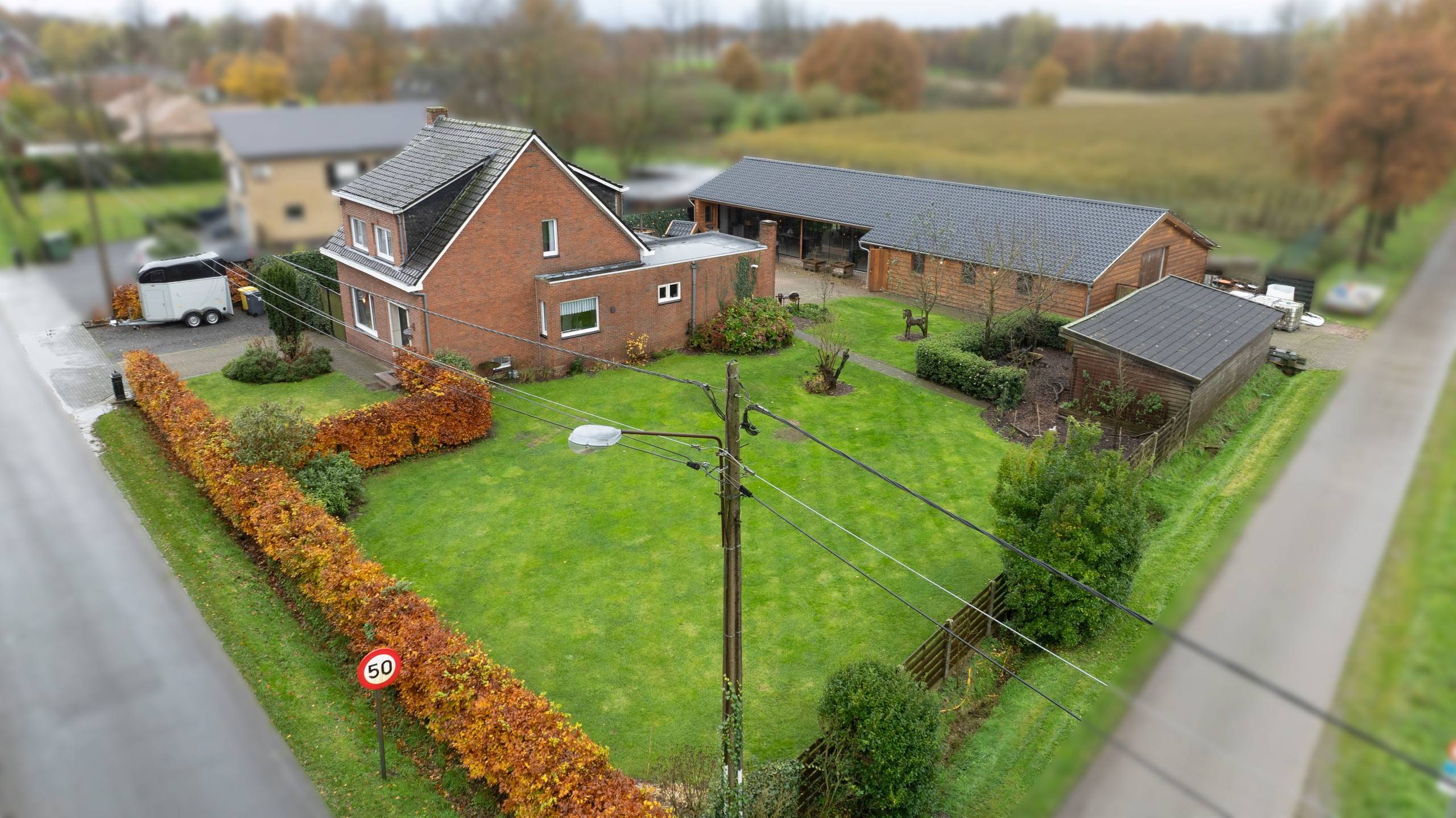 Groen gelegen woning met ruim bijgebouw op perceel van +/-  1.523m² te Poppel! - foto 2