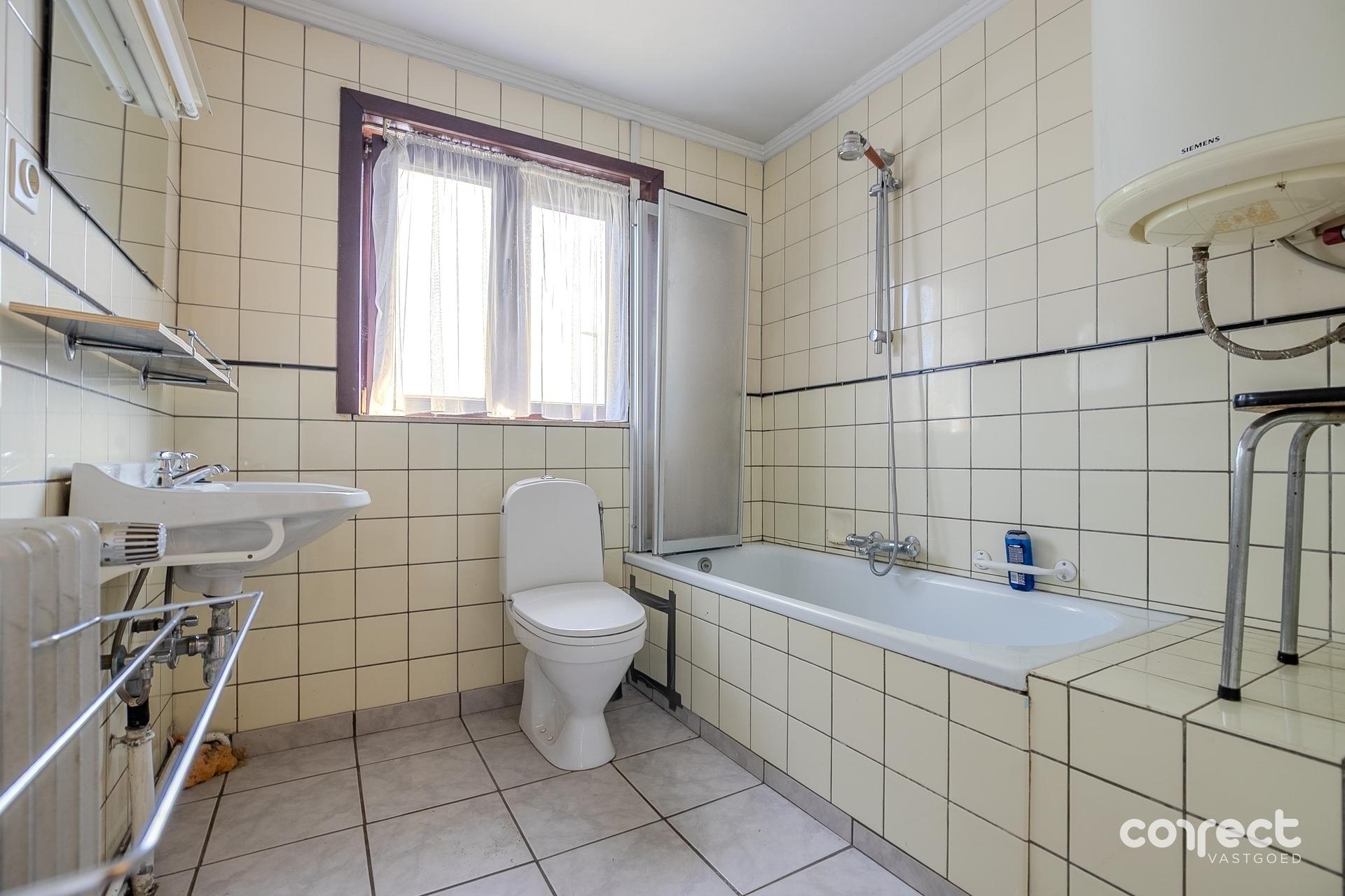 Op te frissen woning op ruim perceel van 857 m². - foto 5