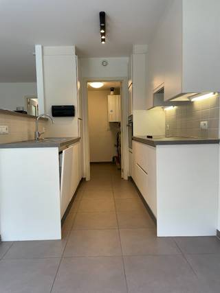 Dit prachtige appartement is gelegen in de rustige en groene omgeving van Merelbeke. Het appartement bevindt zich in een...