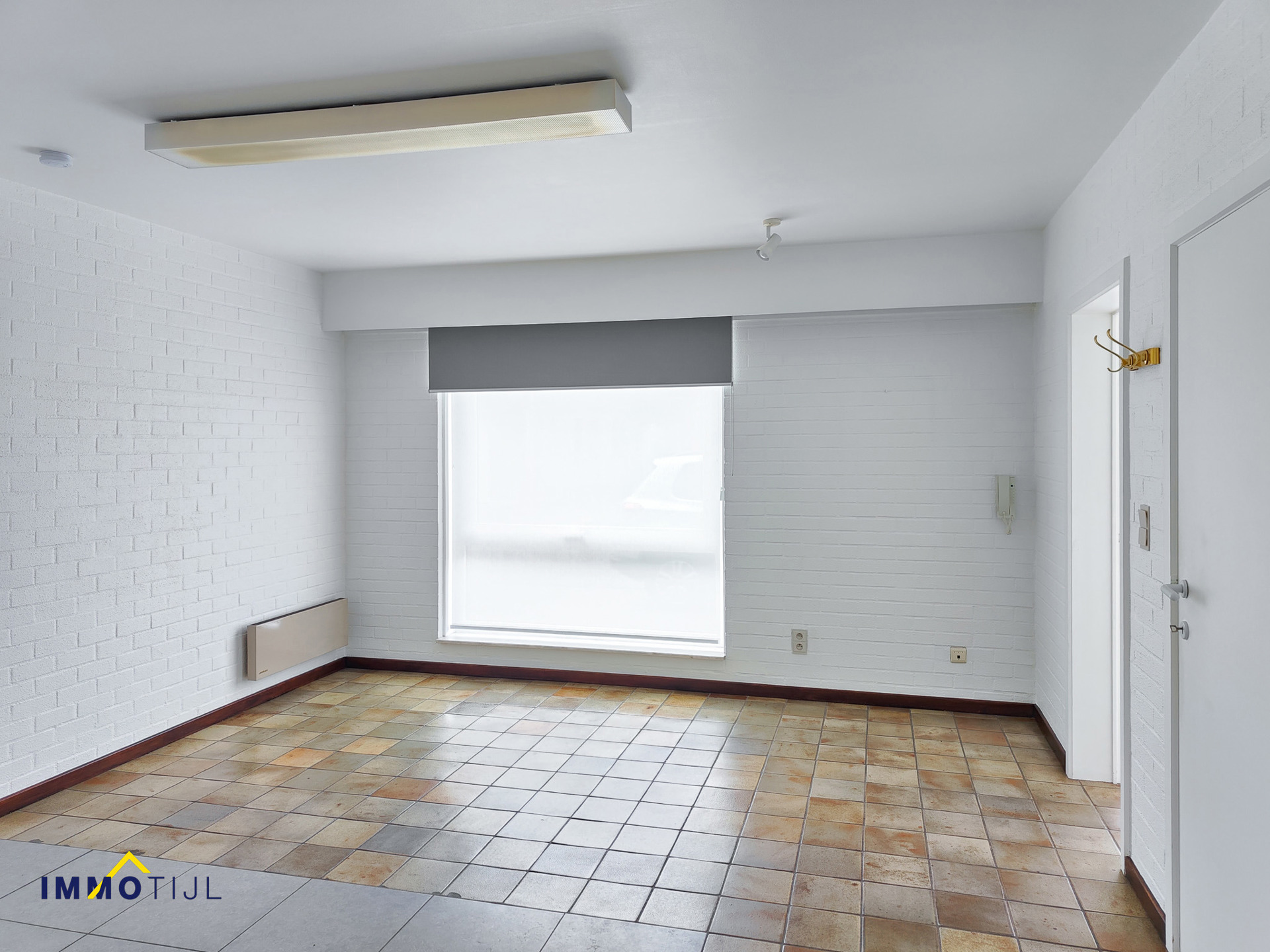 Handelsruimte te huur van 40m² in het dorpscentrum. - foto 4