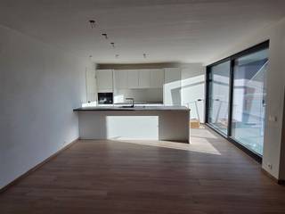 ENERGIEZUINIG, KWALITATIEF EN LUMINEUS NIEUWBOUWAPPARTEMENT MET 2 SLAAPKAMERS, TERRAS EN GROTE GARAGE1ste verdieping met lift - ligging in mooie en...