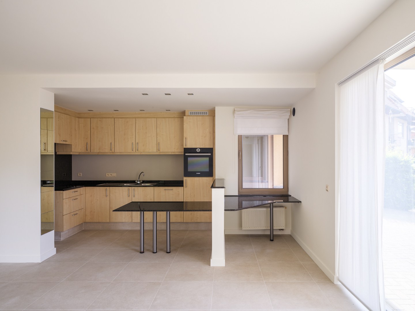 Instapklaar gelijkvloers appartement met 2 slaapkamers en zonnige privétuin - foto 5