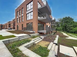 Prachtig nieuwbouwappartement op de gelijkvloerse verdieping, ideaal gelegen te Ottignies-Louvain-la-Neuve in de gegeerde wijk Courbevoie,...