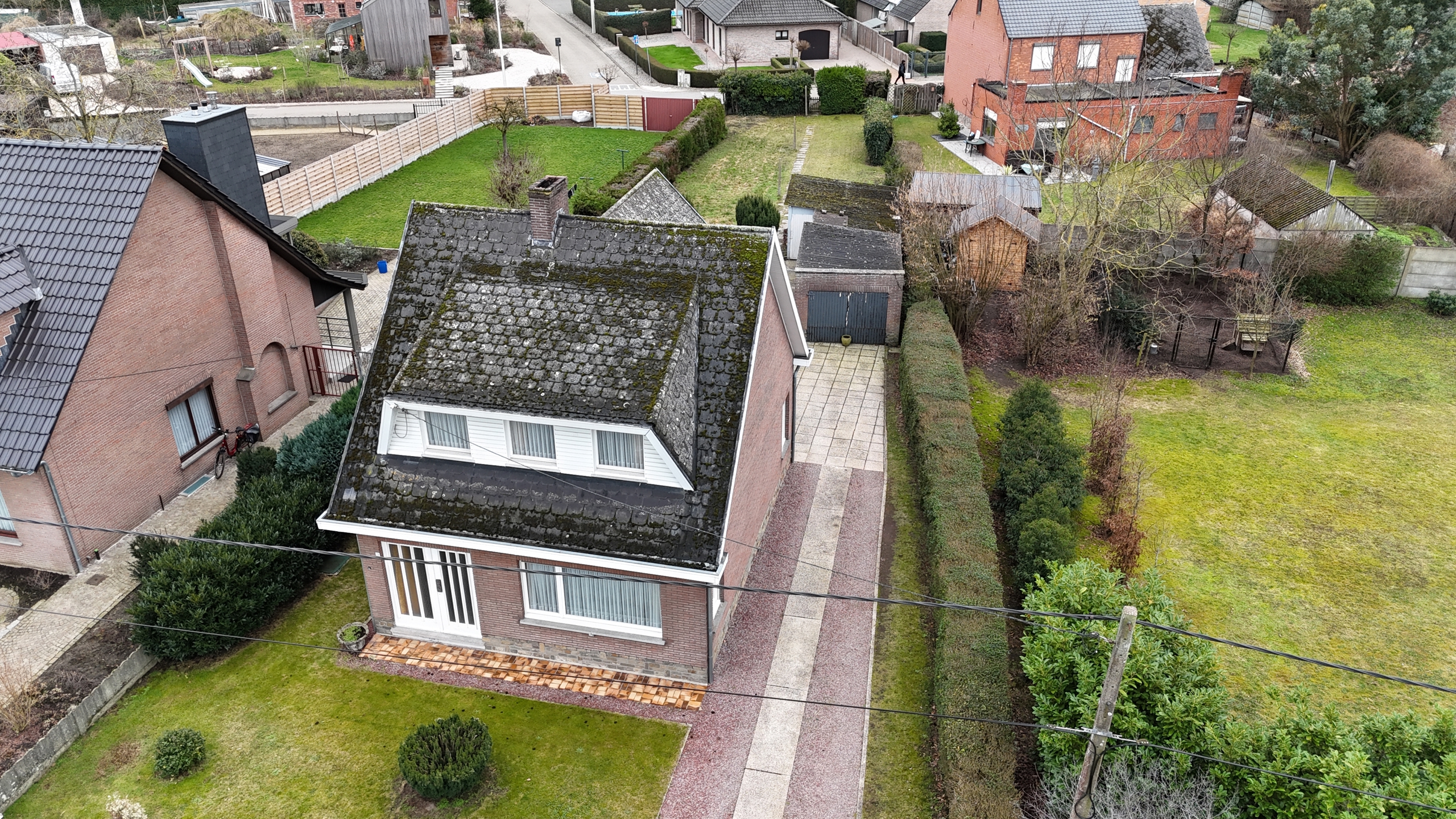 Open bebouwing op 800 m² met zuidgerichte tuin en achterliggende toegang in Eindhout - foto 2