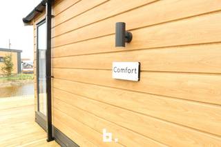 Nieuwe chalet (type Comfort) op topligging vlak aan zee te Wenduine met mooie living met aansluitend terras, open ingerichte keuken, gasten...