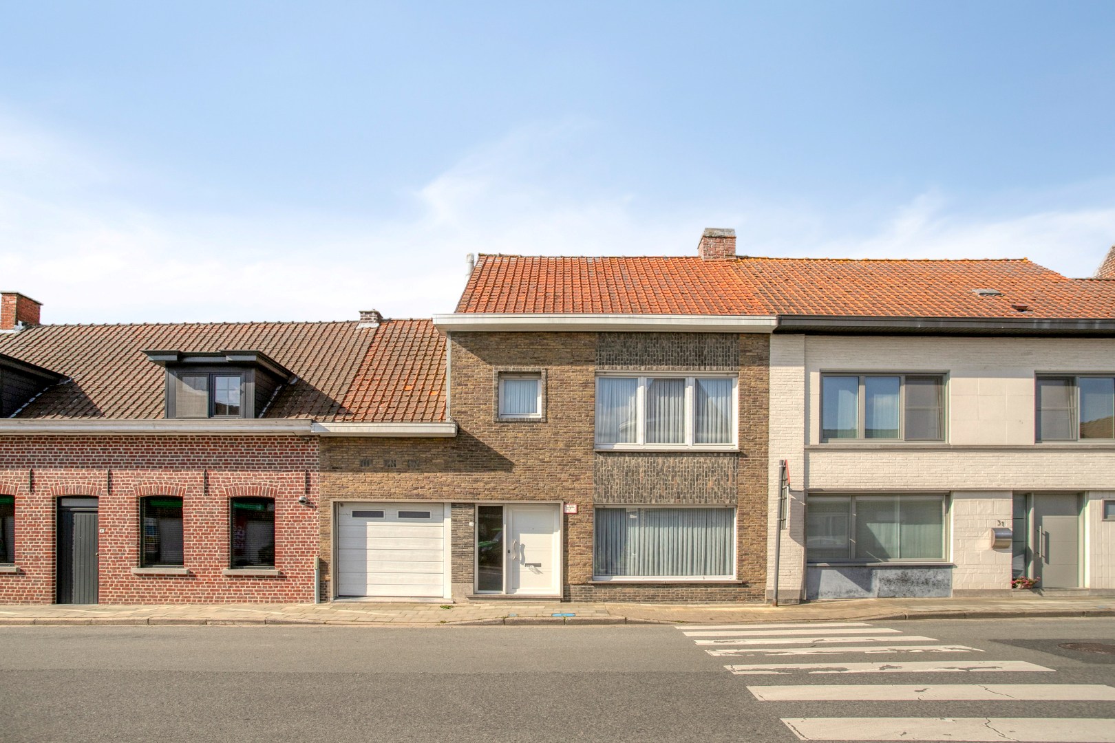 Gezellige rijwoning met 3 slaapkamers en garage! - foto 2