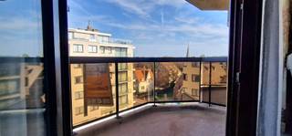 GEZELLIGE STUDIO MET SLAAPHOEK EN ZIJDELINGS ZEEZICHT GELEGEN OP ENKELE METERS VAN HET STRAND TE DE PANNEBestaande uit living met terras en mooi...