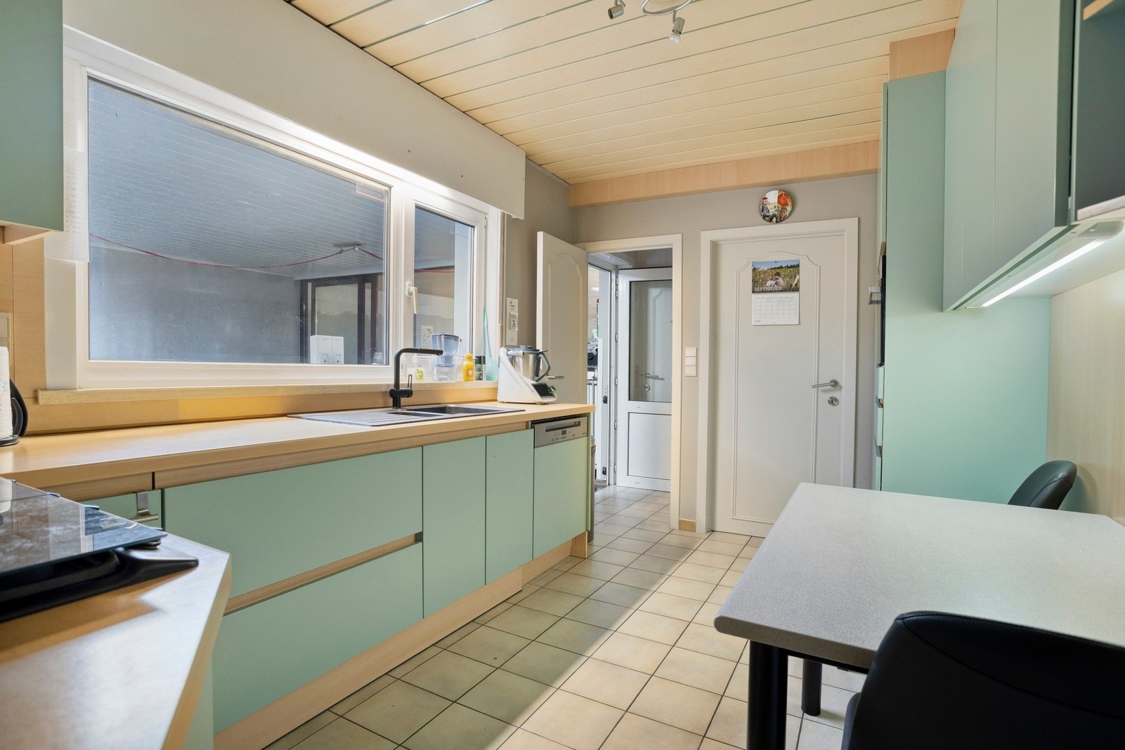 Ruime en veelzijdige (handels)woning met grote polyvalente ruimtes en tuin in Roeselare - foto 5