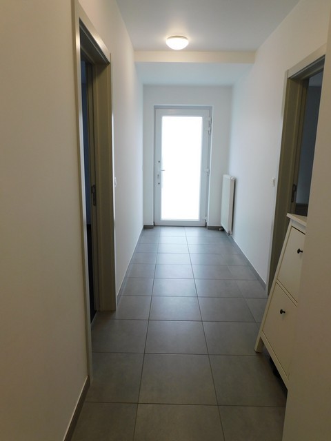 Gelijkvloers appartement in het centrum met autostaanplaats - foto 2