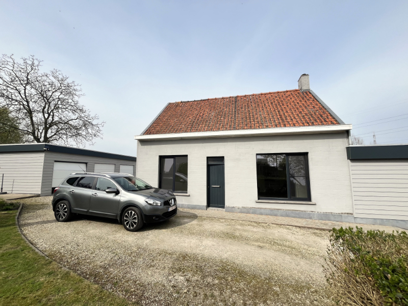 Landelijk gelegen woning met tuin en 3 garages - foto 3