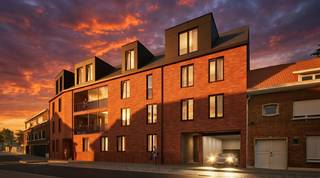 Leuk appartement op de eerste verdieping  + Ondergrondse autostaanplaats . <br /><br />Indeling :Woonkamer met open keuken , groot terras  , berging ,toilet , badkamer met aansluitende slaapkamer .<br />Ondergrondse autostaanplaats inbegrepen . <br /><br />Het appartement wordt voorzien van vloerverwarming met warmtepomp , ventilatiesysteem , zonnepanelen . <br /><br />Plannen + lastenboek te downloaden op onze website . <br /><br />Aankoop aan het verlaagde btw tarief van 6% btw mogelijk . <br />Koop nu en betaal pas bij de oplevering van het appartement . <br /><br /><br /><br /> 