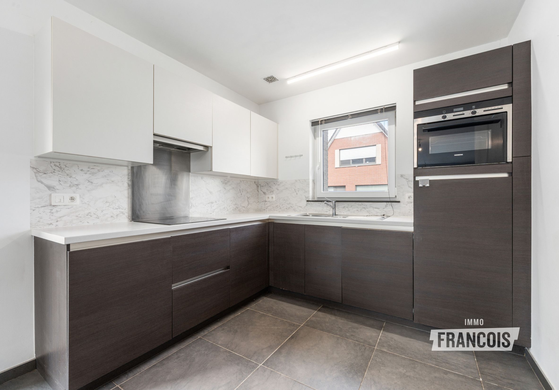 Gelijkvloers appartement met ruime tuin in Zelzate - foto 3