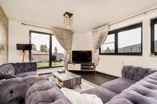 <p><span>Exceptionally spacious 3-bedroom penthouse with an attic floor and 2 south-facing terraces.</span></p><p><span>This exceptionally spacious penthouse is located on the third floor of a small-scale, well-maintained building. Thanks to the large windows, the living area with dining space enjoys an abundance of natural light and a pleasant, open feel. From the living area, you have direct access to the sunny, south-facing terrace—the ideal spot to relax in peace and quiet.</span></p><p><span>The fully equipped kitchen features an induction cooktop, range hood, dishwasher, microwave, oven, and refrigerator, and offers every convenience for those who love to cook.</span></p><p><span>The apartment has no fewer than five full-sized bedrooms. Two of these are located on the fully finished attic floor and are equipped with air conditioning, offering additional possibilities such as a home office, hobby room, or playroom. This well-thought-out layout makes the home perfectly suited for a large family or anyone who simply wants extra space.</span></p><p><span>The bathroom is equipped with a bathtub, shower, and double sink vanity. There is also a separate toilet and a spacious storage room.</span></p><p><span>An added bonus is the elevator that provides direct access to the apartment, ensuring optimal comfort and privacy.</span></p><p><span>Quietly located yet easily accessible, just a short distance from downtown. A garage space must be purchased separately for € 29,000.</span><span> </span></p><p><span> </span></p>