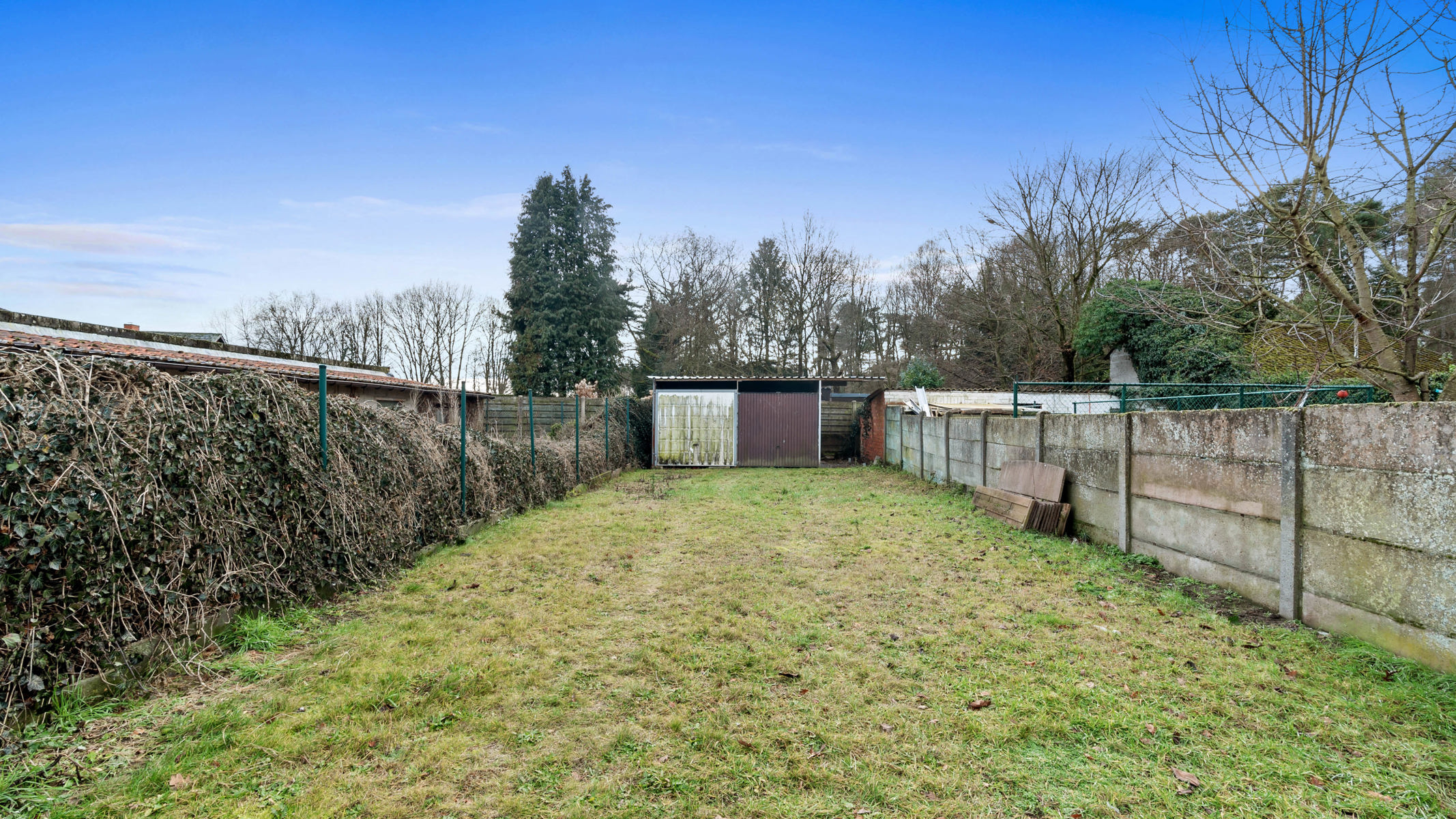 Deels te renoveren starterswoning met diepe tuin in groene, rustige omgeving - foto 3