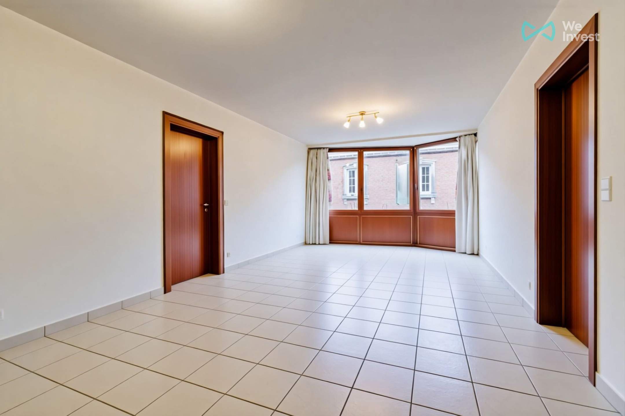 Licht appartement met 2 slaapkamers in het centrum - foto 2