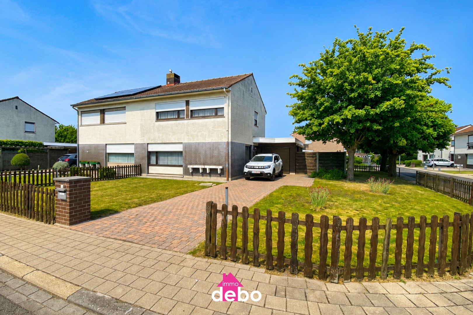 Charmante halfopen bebouwing met 3 slaapkamers, zonnige tuin en ruime garage - photo 2