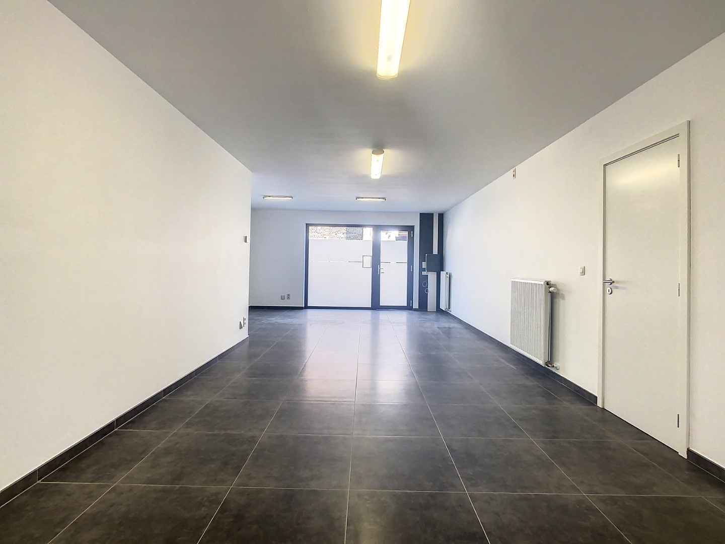 Te huur handelsruimte (60m²) op toplocatie in het centrum van Ronse - foto 4