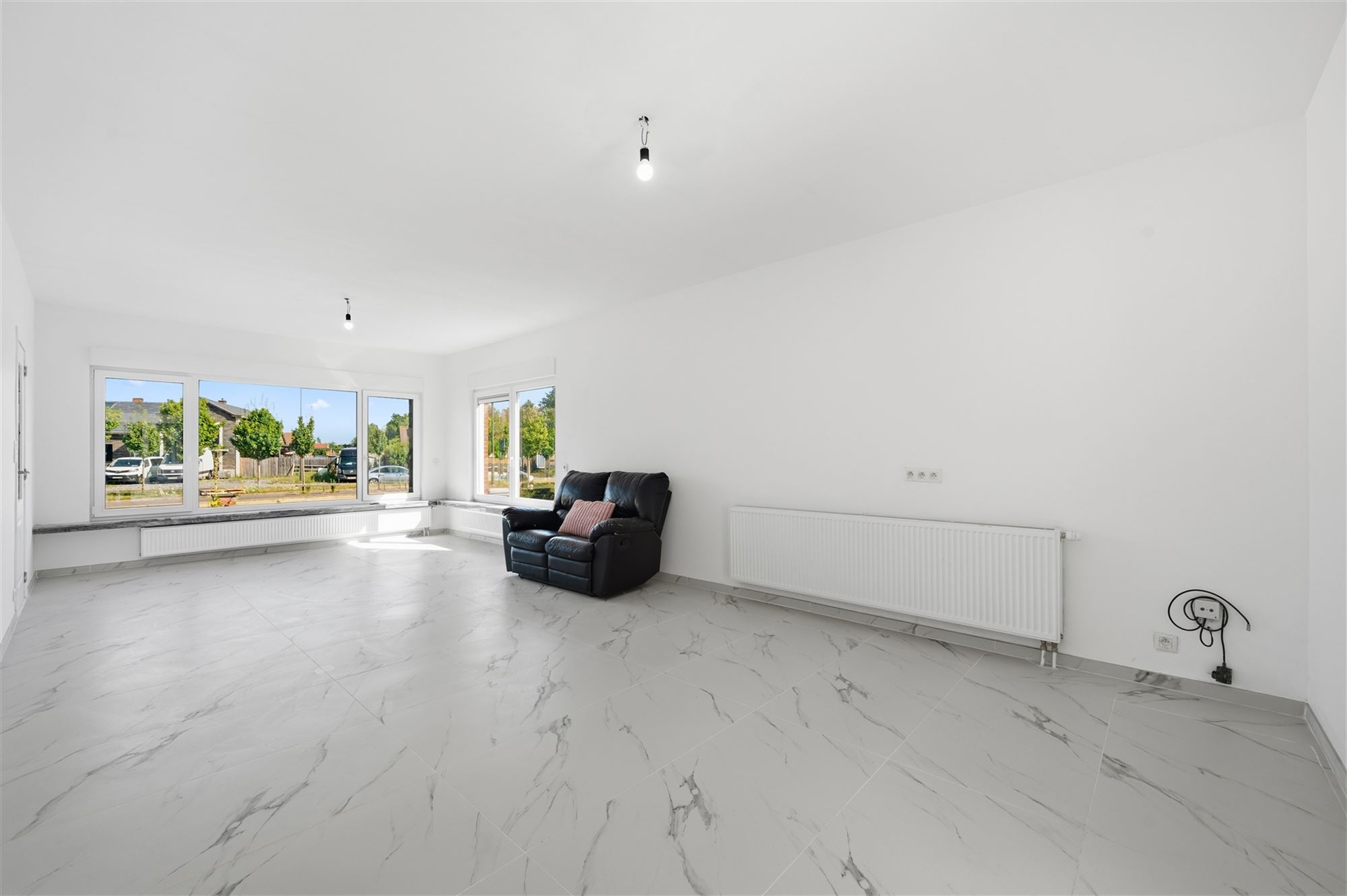 Gelijkvloerse woning met 4 kamers, garage en tuin - foto 5