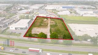 <strong>Fantastische gelegen industriegrond</strong> met een totale oppervlakte van <strong>12.782 m</strong>² te koop met zichtlocatie te Puurs-Sint-Amands.<br /><br />Op het perceel kan een <strong>bedrijfsgebouw van +/- 5.800 m</strong>² gerealiseerd worden. De grond wordt momenteel gesaneerd en <strong>gelegen in een milieubelastende industriezone</strong>. Daarnaast is de plaatsing van een HS-cabine mogelijk met een capaciteit van 630 kVa.<br /><br />Het terrein bevindt zich in de Rijksweg te Puurs-Sint-Amands, in de <strong>oksel van het op-en aftrittencomplex A12 Breendonk (7)</strong>. Deze superieure ligging biedt <strong>grote visibiliteit</strong> en een <strong>zeer vlotte aansluiting op de A12 en N16</strong> met directe verbinding naar Mechelen, Antwerpen, Sint-Niklaas en Brussel.<br /><br />De verkoop <strong>verloopt via biedingssysteem</strong> en verdere informatie, documentatie en toegang tot de dataroom zijn beschikbaar op aanvraag.<br /><br />Verdere informatie of toegang tot het volledige dossier via <strong>PANORAMA B2B</strong> op het nummer <strong>03 225 03 03</strong>.