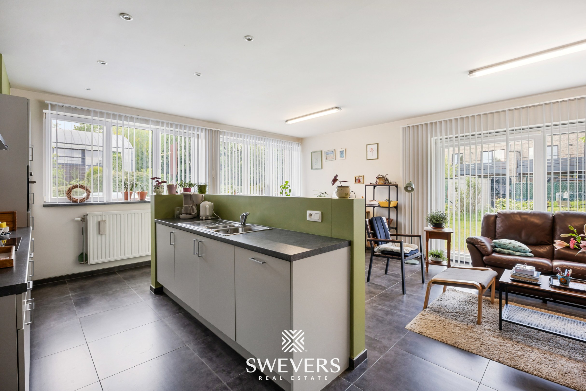 Gelijkvloers appartement met twee slaapkamers en bouwgrond te Herk-de-Stad - foto 4