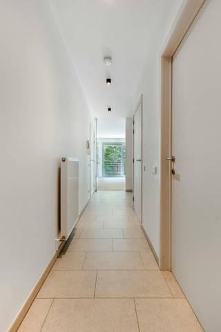 This beautiful and ready-to-move-in apartment on the first floor on the left (elevator available) combines space, natural light with large windows and a practical layout in a prime location in Maria ter Heide, Brasschaat <br /><br />Layout:<br />- Entrance hall with built-in cupboards<br />- Spacious living space (living room + kitchen) with large windows and parquet flooring<br />- Handy storage room with washer/dryer connection<br />- 2 full bedrooms (15 m², 11 m²) with built-in wardrobes and parquet flooring<br />- Separate guest toilet<br />- Bathroom with double sink and a bath with shower function <br />- 17m² terrace with closed storage space (ZO orientation)<br /><br />In addition, the apartment has a parking space in a closed garage (external) and a closed storage room.<br /><br />Details:<br />- EPC 117 kWh/m² year - (label B)<br />- Free by authentic deed<br />- Common costs: €200/month<br /><br />Interested in an on-site viewing? Do not hesitate to contact us at 03 666 66 66 - If you would like a free estimate of your property via our real estate office, please email us at brasschaat@dewaele.com<br /><br />Register of measures: no