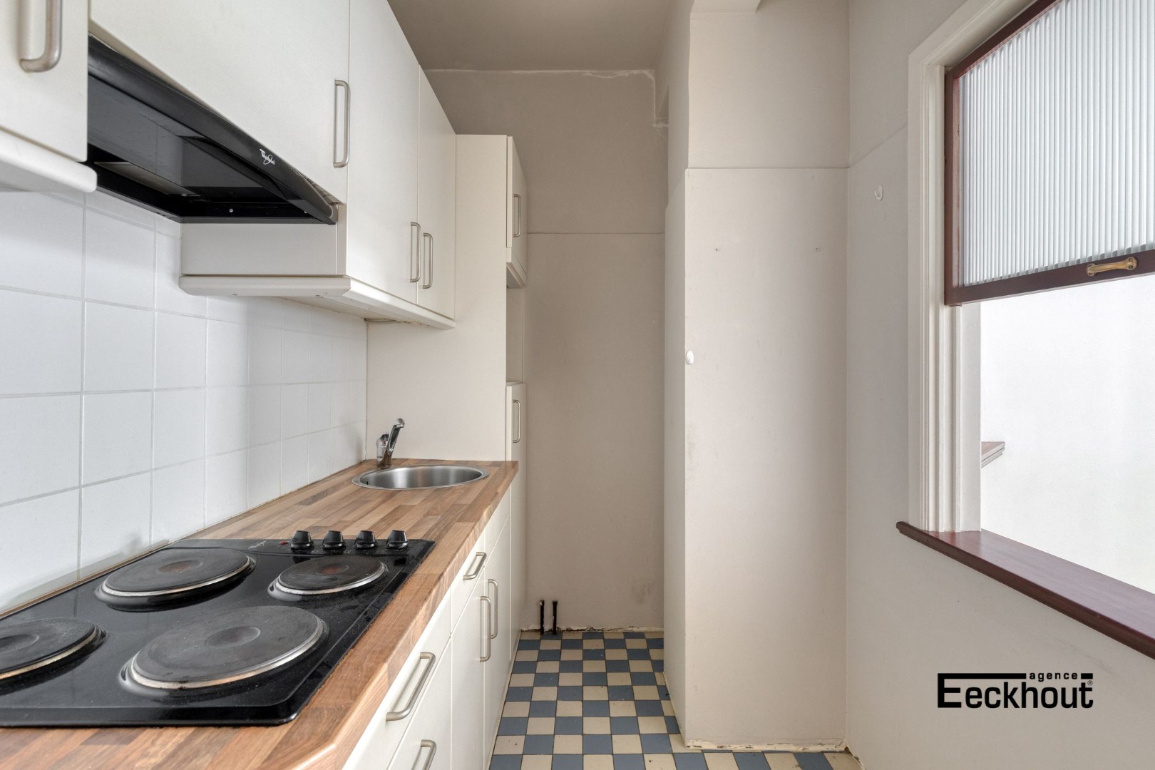 Centraal gelegen gelijkvloersappartement met zonnige koer! - foto 5