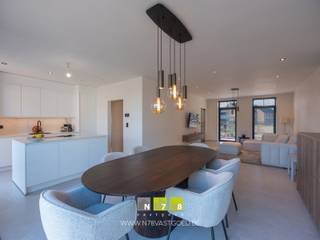 <span><strong>VRIJSTAANDE NIEUWBOUWWONING MET 3 SLAAPKAMERS OP EEN PERCEEL VAN 5A 43CA TE NEEROETEREN<br /><br />TROEVEN<br /></strong>- Instapklare nieuwbouwwoning.<br />- Gelegen in een rustige en kindvriendelijke woonwijk nabij het centrum van Neeroeteren.<br />- EPC-label A: energiezuinige woning!<br />- Vergunning voor het bouwen van een carport aan de rechter zijgevel van de woning.<br />- <span>Moderne keuken met eiland en apparatuur.<br /></span></span><span><span></span>- Woning afgewerkt in hoogwaardige en kwalitatieve materialen (binnendeuren, keuken, inbouwkasten, ...).<br />- Zonnepanelen aanwezig.<br />- Omheinde tuin met terras en tuinberging.<br />- Verkoop onder verkooprechten (2% voor rechthebbenden).<br />- Mogelijkheden voor het inrichten van een burearuimte/dressing, vraag hier meer info over tijdens jouw bezoek! <strong><br /><br />GELIJKVLOERS 00 (63,96 m²)<br /></strong>- Inkomhal (2,94 m x 1,00 m = 2,94 m²): toegang tot het gastentoilet en de woonkamer, aluminium binnendeur, trap naar eerste verdieping, tegelvloer.<br />- Woonkamer (4,12 m x 9,50 m = 39,14 m²): open leefruimte voorzien van inbouwkasten en verbonden met de keuken + eetkamer, schuifraam naar terras/tuin, tegelvoer.</span><br /><span>- Keuken (3,08 m x 3,50 m = 10,78 m²): keukenwand (onder- en bovenkasten, koelkast, vaatwasser, combi-oven en spoelbak), keukeneiland (inductiekookplaat, dampkap, werkblad, onderkasten), tegelvloer.</span><br /><span>- Gastentoilet (1,00 m x 1,80 m = 1,80 m²): hangtoilet, spoelbakje, tegelvloer.</span><br /><span>- Berging (3,02 m x 3,08 m = 9,30 m²): inbouwkasten, aansluiting voor wasmachine en droogkast, spoelbak, tegelvloer.</span><br /><br /><br /><span><strong>VERDIEPING</strong> <strong>+01 (62,37 m²)</strong></span><br /><span>- Overloop (12,90 m²): luik naar zolder, toegang tot de 3 slaapkamers en badkamer, steenparket. <br />- Badkamer (2,87 m x 4,12 m = 11,82 m²): ligbad, inloopdouche, badkamermeubel (dubbele lavabo, onderkasten), steenparket.<br />- Slaapkamer 1 (4,12 m x 3,10 m = 12,77 m²): steenparket.<br />- Slaapkamer 2 (3,50 m x 3,61 m = 12,63 m²): steenparket.<br />- Slaapkamer 3 (3,50 m x 3,50 m = 12,25 m²): steenparket.<br />- Kleine bureauruimte: tegelvloer.<br />- Toilet: hangtoilet, spoelbakje, steenparket.<br /><br /><strong>VERDIEPING</strong> <strong>+02 (20,80 m²)</strong><br />- Zolderruimte (7,20 m x 2,89 m = 20,80 m²): gestorte beton.</span><br /><br /><span><strong>EXTERIEUR</strong></span><br /><span>- Omheinde tuin met terrras en tuinberging van 9 m².<br /><br /><strong>14 ZONNEPANELEN</strong><br /><span>- In de verkoopprijs zit het volledige zonnepanelensysteem begrepen (zonnepanelen, omvormer, collectoren e.a. toebehoren).<br /><br /><strong>VERKOOP ONDER VERKOOPRECHTEN</strong><br />De verkoop zal plaatsvinden onder verkooprechten, waardoor rechthebbenden kunnen genieten van 2% verkooprechten overheen de aankoopprijs. De verkoop vindt dus niet plaats onder het BTW-stelsel.</span><span><br /></span><br />Bekijkt u deze advertentie via een aanverwante vastgoedsite, surf dan zeker naar onze website <strong>www.N78vastgoed.be</strong> voor een uitgebreide beschrijving en foto's. <strong>Meer info: +32 (0)89 86 18 88 of info@N78vastgoed.be.</strong></span>
