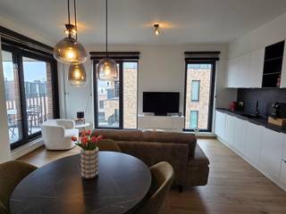 ENERGIEZUINIG, LUMINEUS, SMAAKVOL EN KWALITATIEF NIEUWBOUW-APPARTEMENT MET 1 SLAAPKAMER, TERRAS, ONDERGRONDSE AUTOSTAANPLAATS EN...