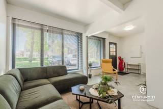 A beautiful, centrally located corner house just a stone’s throw from the center of Arendonk and close to the Dutch border. This surprisingly spacious home offers plenty of possibilities and can be fully customized to your own taste with just a few finishing touches.<br /><br />Upon entering the home, the exceptionally spacious living area immediately catches the eye. This space formerly served as a small independent business and now offers plenty of possibilities for those who wish to combine living and working or simply enjoy a large living room. Adjacent to this is a separate office space, as well as a cozy sitting room at the back that flows seamlessly into the dining room.<br /><br />The dining room adjoins the recently renovated kitchen, which has been tastefully decorated and is equipped with all modern conveniences. Next to the kitchen is a practical laundry/storage room. From the dining room, you have access to the paved backyard with a covered terrace and storage shed. Here, too, there are opportunities to further finish or decorate to your own taste. Thanks to the convenient back gate, you can also easily access the rear of the property with bicycles or trash bins.<br /><br />The first floor features two spacious bedrooms and a generous bathroom, divided into two sections, which can still be partially finished to your personal taste. The second floor offers additional space with a walk-in closet, two full-sized rooms, and access to the attic.