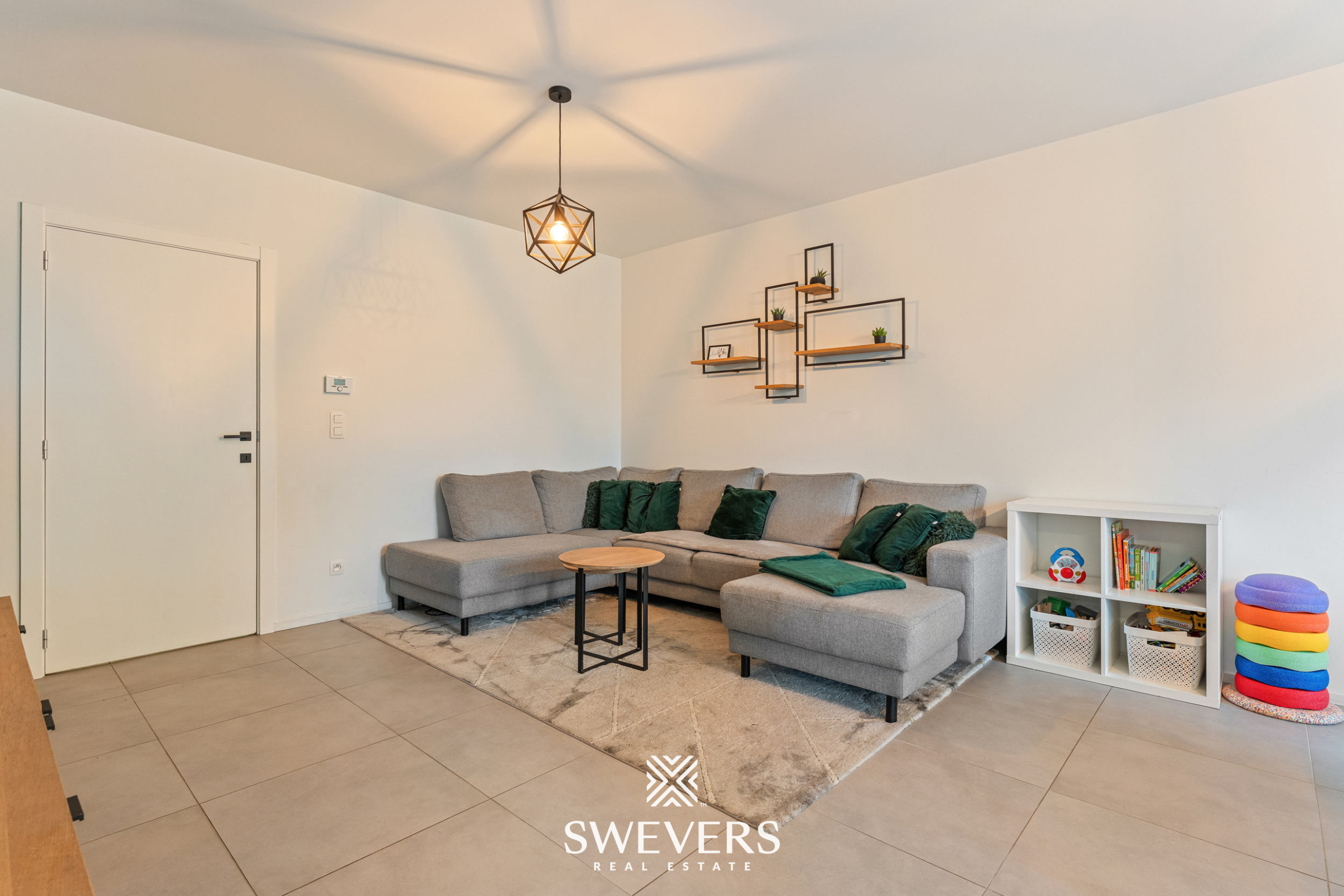 Instapklaar gelijkvloers 2 slpk-appartement met terras en tuin in Heusden. - foto 5